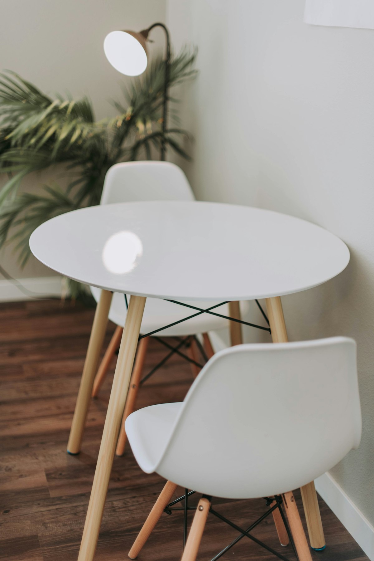 Dining collection — solid oak table with ceramic vessels